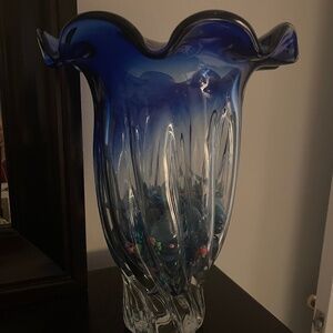 Blue vase with pebbles